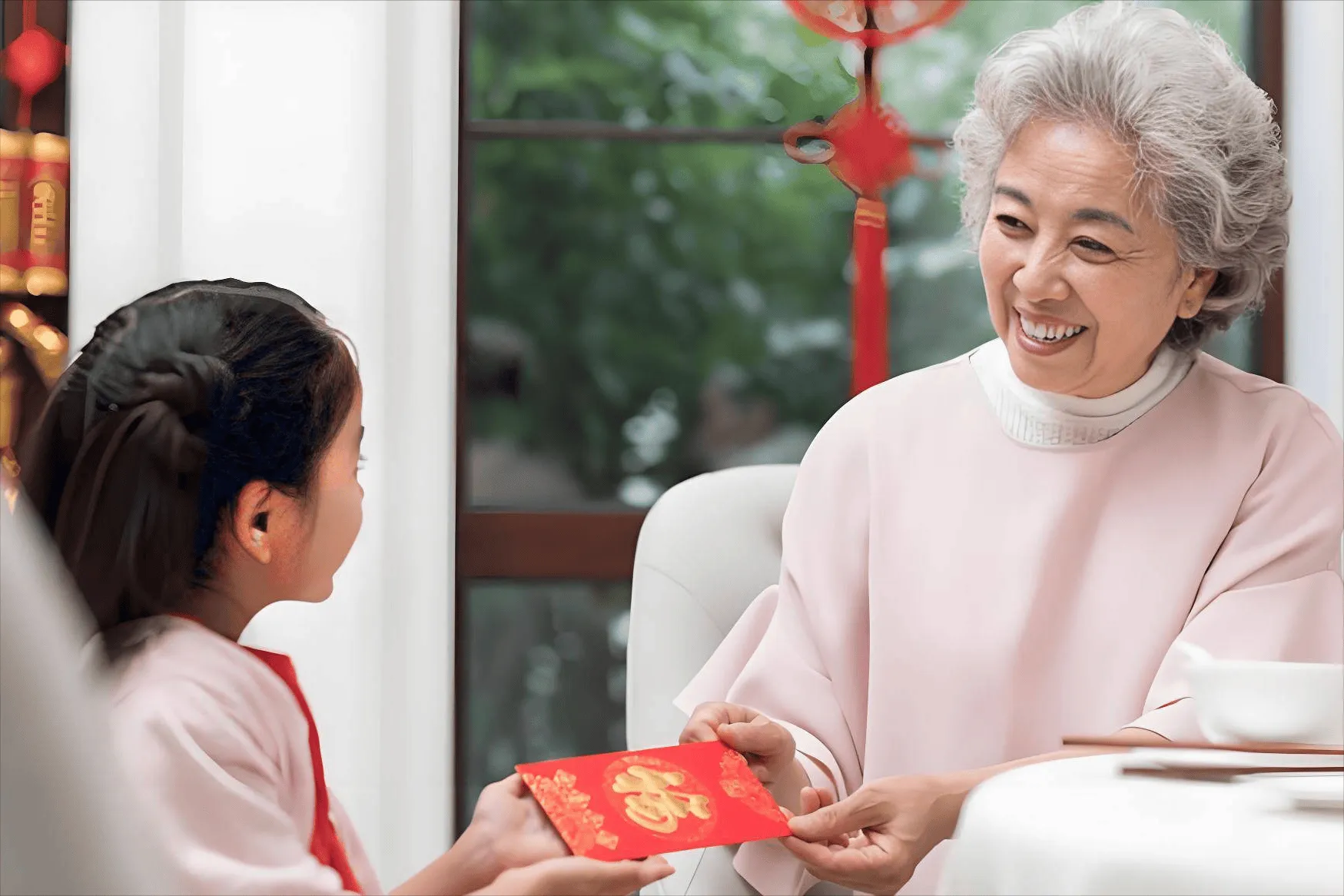 Elder giving hongbao to child