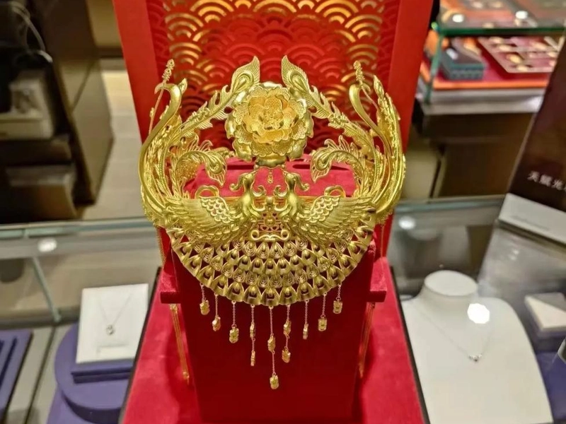 Gold contacts on a microchip under a microscope; this ancient metal now serves as 