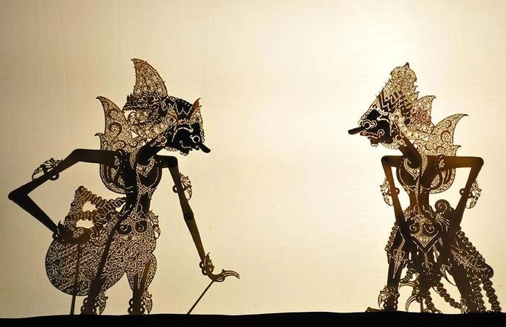Huaxian shadow puppetry performance with leather figures
