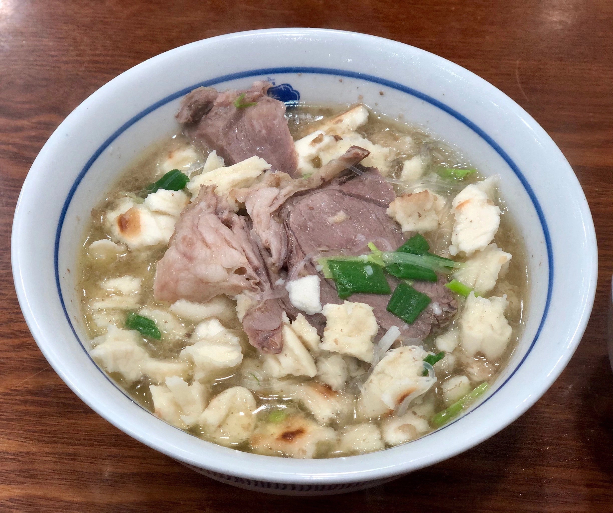 Yangrou Paomo - pita bread soaked in lamb soup