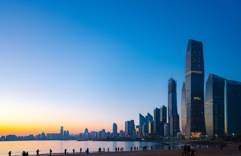 Badaguan architecture in Qingdao, Shandong, showcasing red tiles, green trees, and historical charm