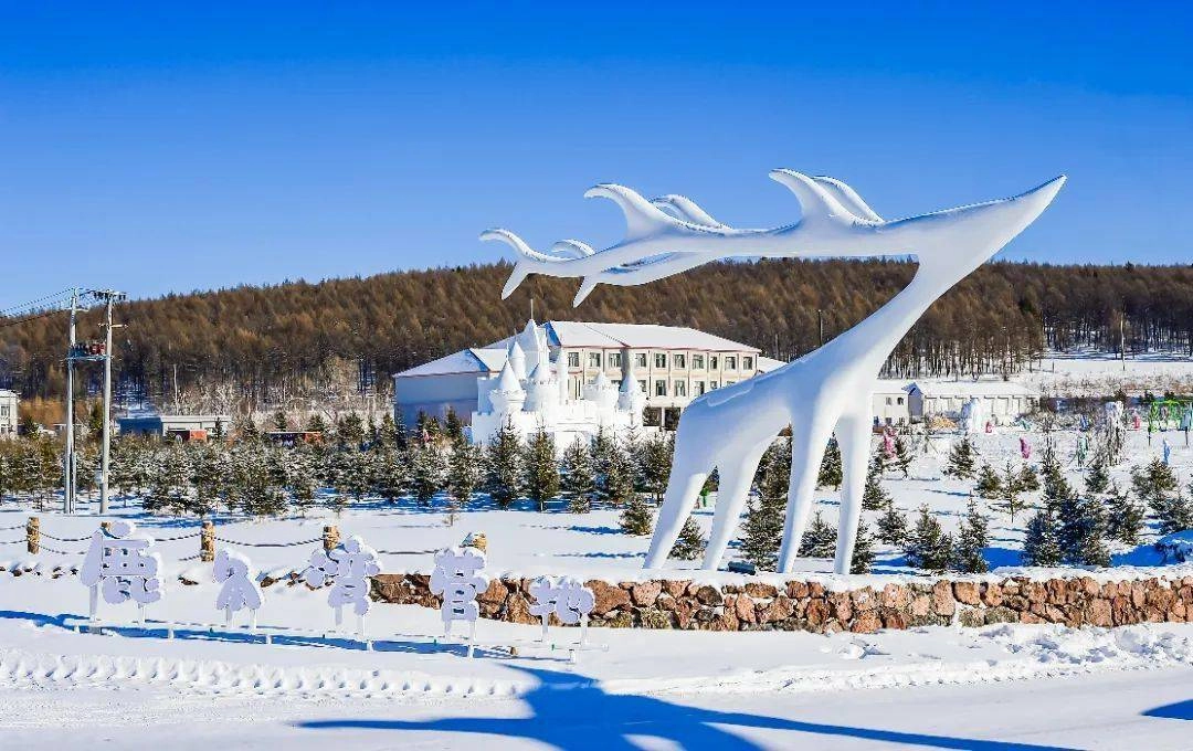 Winter wonderland at Arxan Ice and Snow Festival with ice sculptures and snow-covered landscape