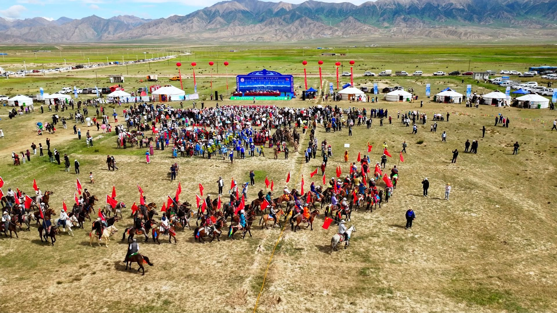Traditional Nadam Festival with wrestling, horse racing and archery competitions on summer grassland