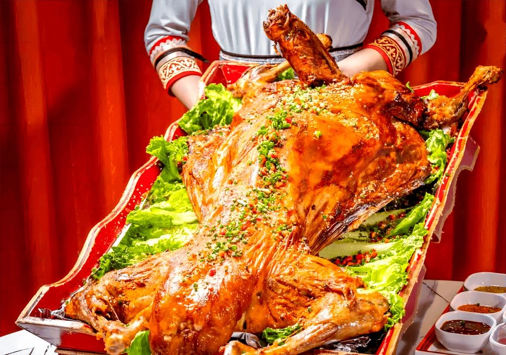 Golden roasted whole lamb prepared for traditional Mongolian celebration