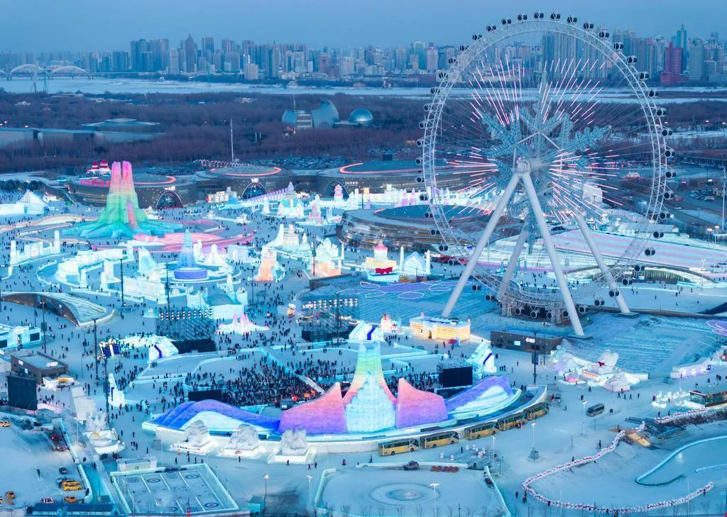 Harbin Ice and Snow World with illuminated ice castles and sculptures at night