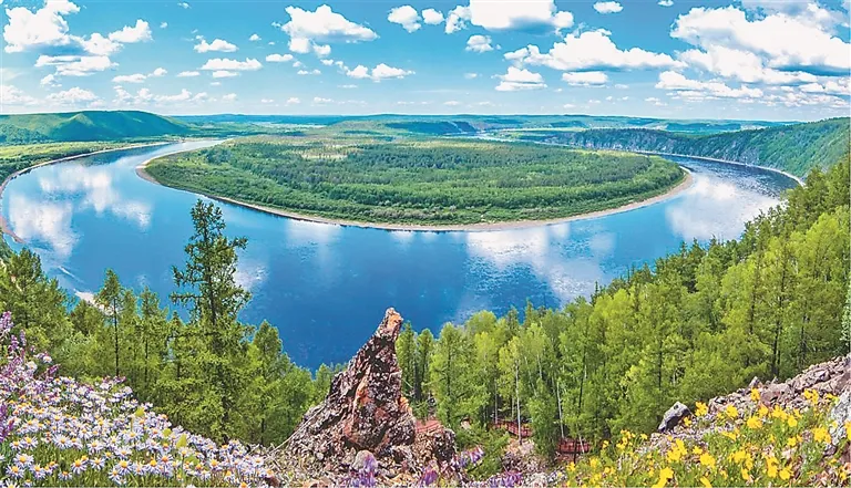 Summer landscape of Jingpo Lake with waterfalls and rainbow in Heilongjiang