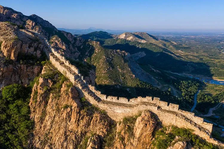 Shanhai Pass Great Wall with ancient gate tower and Laolongtou sea entrance