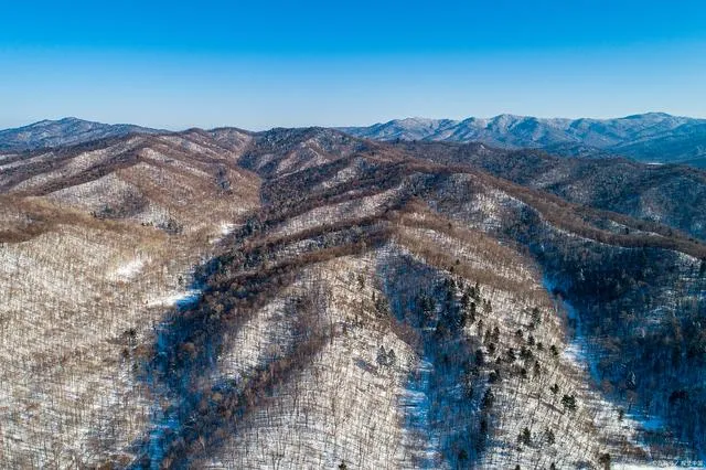 Winter wonderland in Hebei with snow-covered landscapes and ice activities