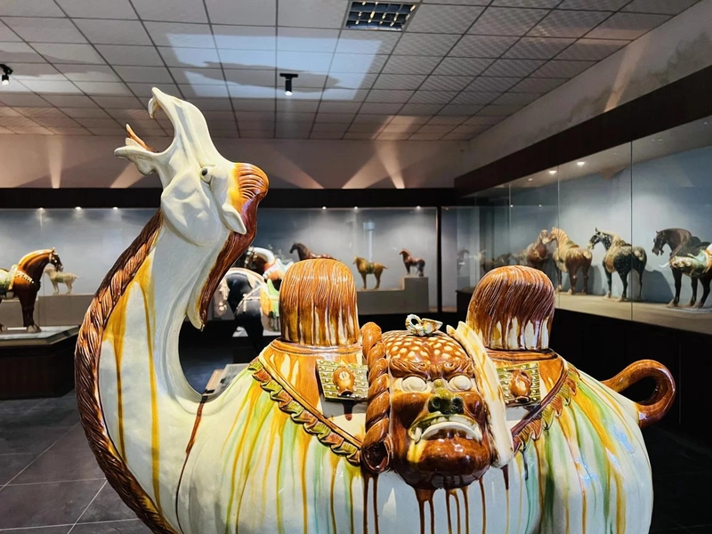 Tang Sancai ceramic artworks with vibrant yellow, green and white glazes