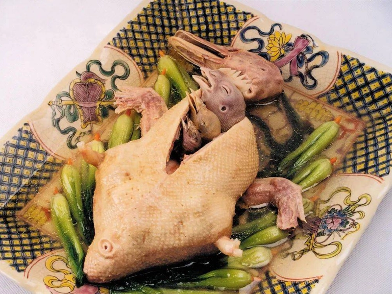 Four Treasures Set dish with layered poultry in traditional presentation