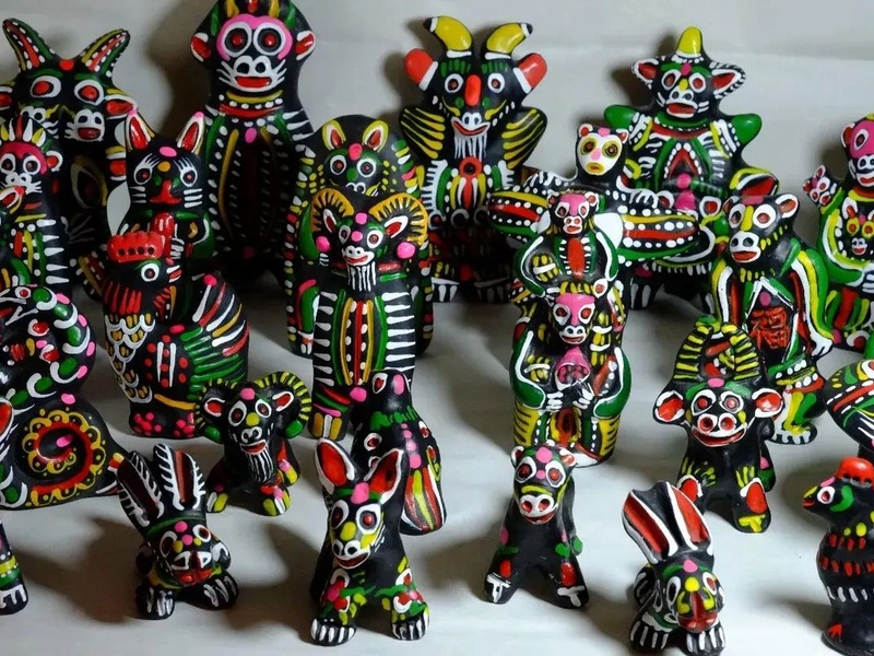 Colorful Huaiyang clay figurines with traditional patterns