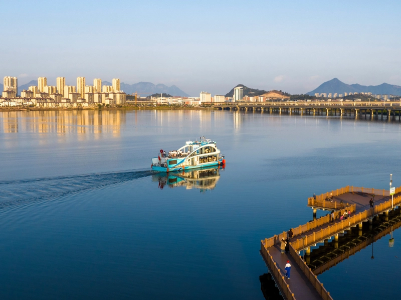Sunrise over Xiapu tidal flats in Ningde, with fishing nets and She ethnic culture blending with the sea