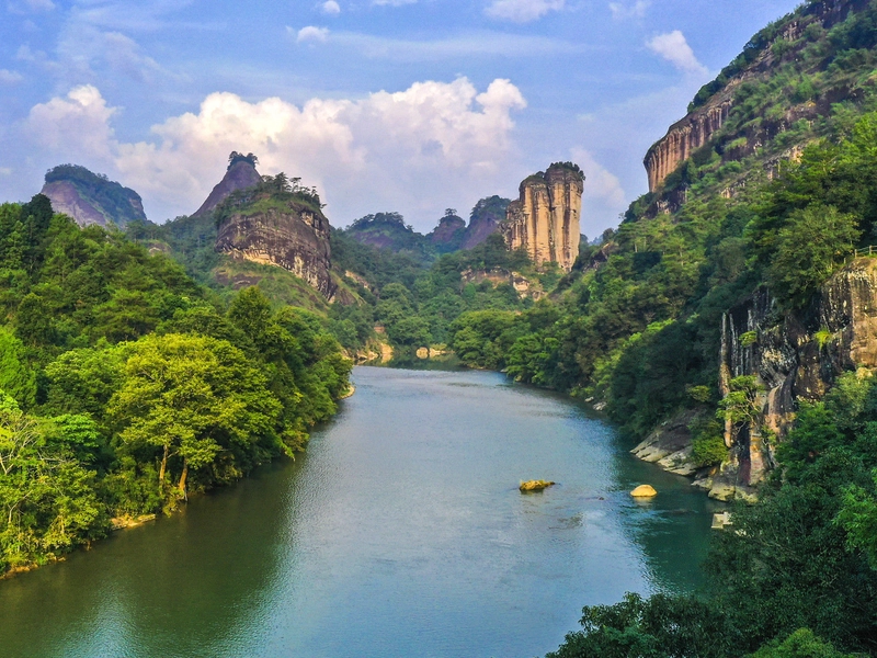 Wuyi Mountains landscape with Jiuqu Stream, bamboo rafts and tea plantations