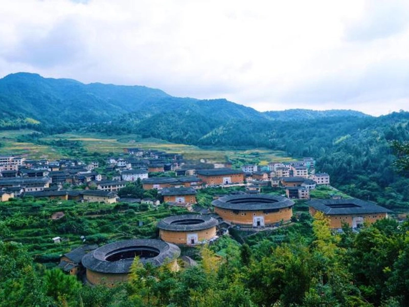 Fujian Tulou circular earth buildings nestled in mountainous landscape