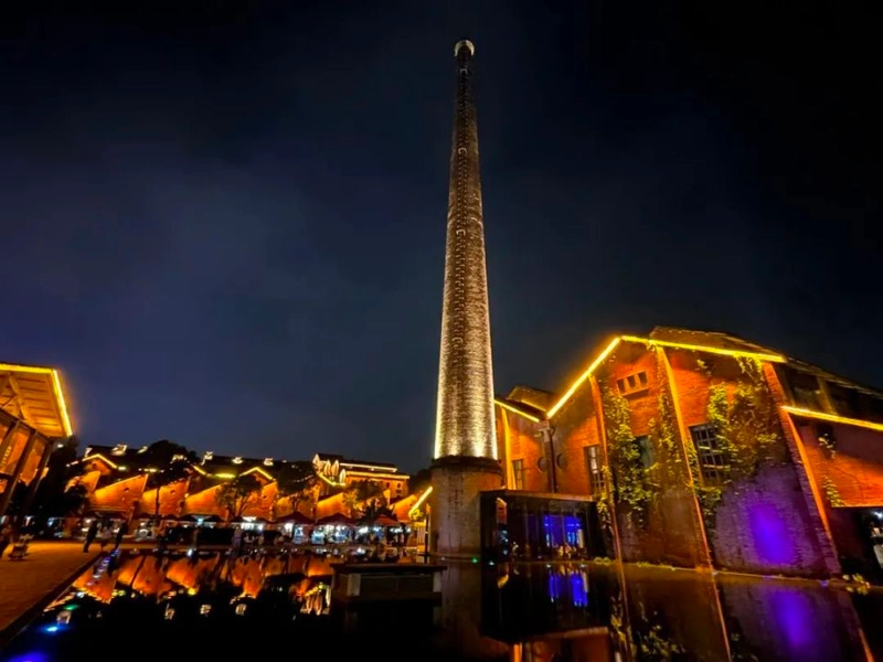 Jingdezhen porcelain artisans at work with blue-and-white porcelain pieces