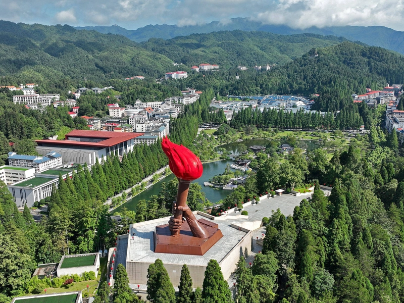 Jinggang Mountain revolutionary sites with dense forests and rugged peaks