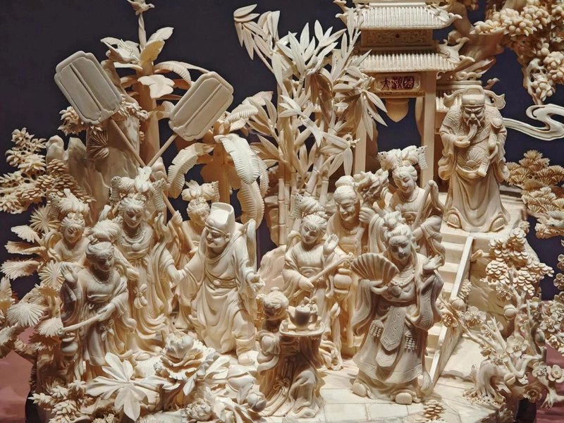 Ganzhou woodcarving details showing intricate dragon and floral patterns