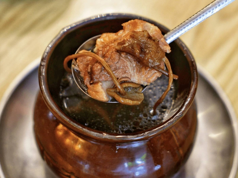 Clay Pot Soup with meat and vegetables slow-cooked in earthenware