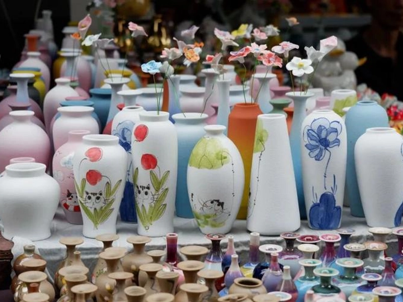Jingdezhen porcelain pieces including blue-and-white and famille rose styles