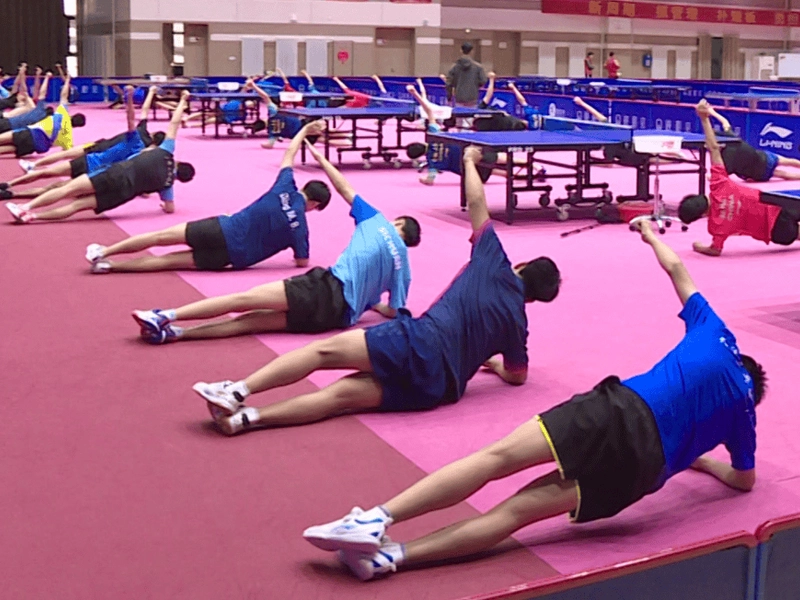 Chinese national team training with multi-ball drills and video analysis