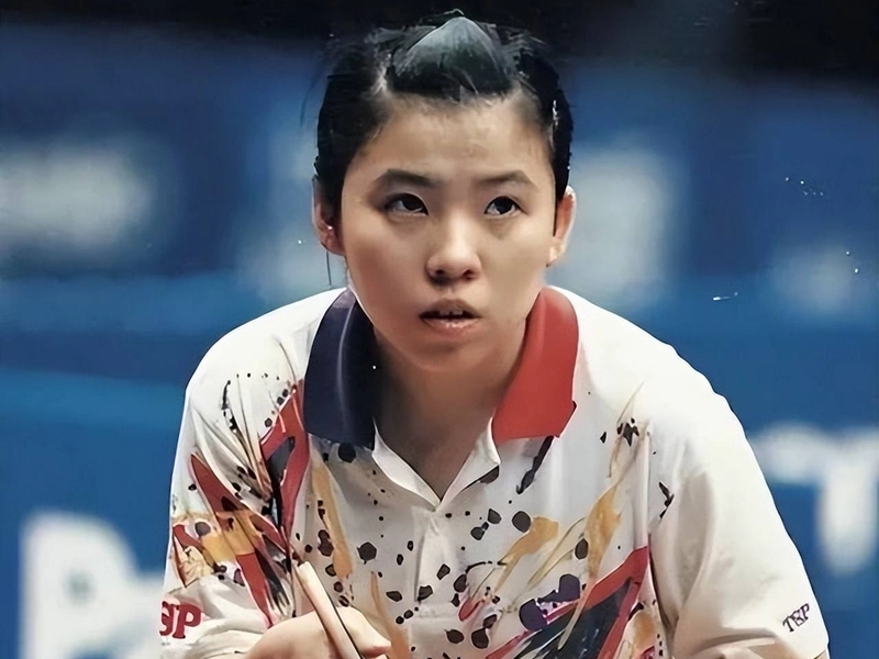 Deng Yaping playing table tennis with her unique style