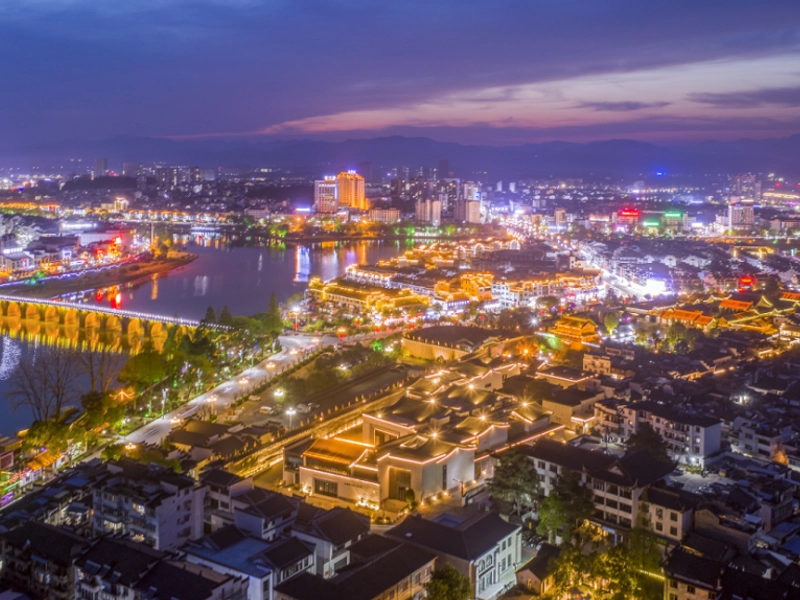 Huangshan mountains with sea of clouds, pine trees, and ancient villages
