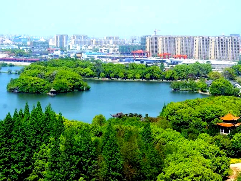 Wuhu city along the Yangtze River with modern urban buildings and historical landmarks