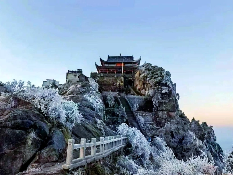 Jiuhuashan Buddhist mountain with temples, peaks, and misty clouds