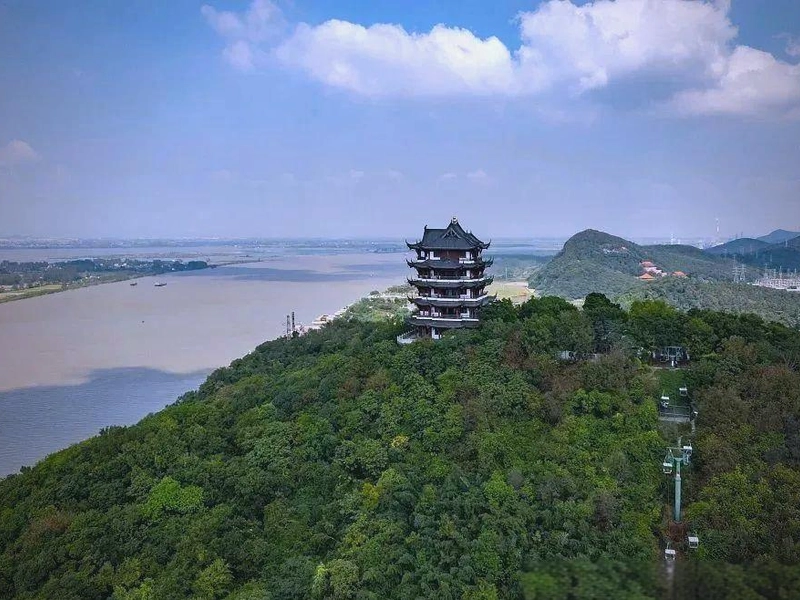 Caishi Cliff on the Yangtze River with steep cliffs, rushing waters, and historical inscriptions