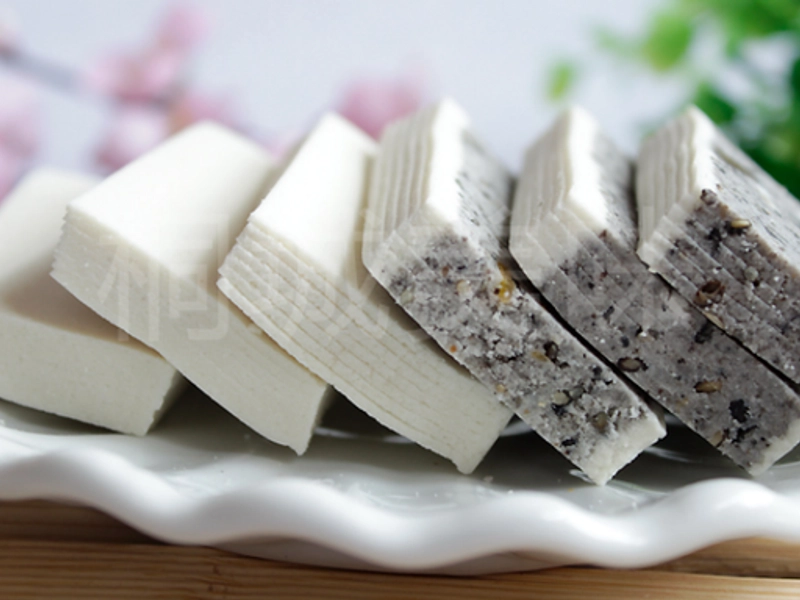 Assorted Huizhou souvenirs including Jixi Zisha teapots, Xuancheng brushes, embroidery, and pastries