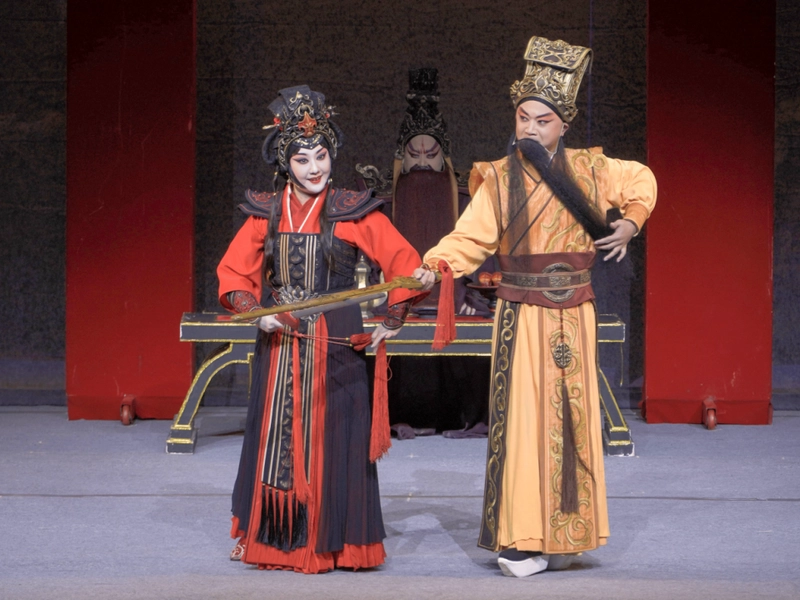 Han Opera performers on stage in colorful costumes performing Hubei Hanju