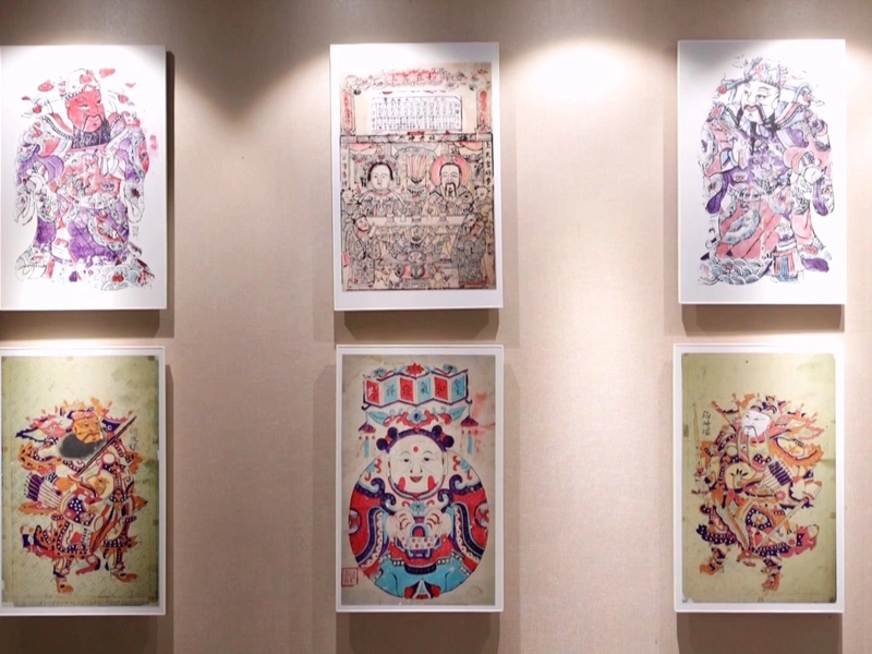 Hubei Woodblock New Year prints and paper-cutting with traditional motifs of dragons and flowers