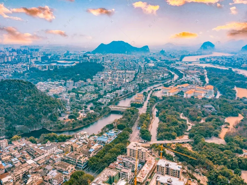 Guilin karst landscape with the Li River winding through emerald peaks, Elephant Trunk Hill in the background