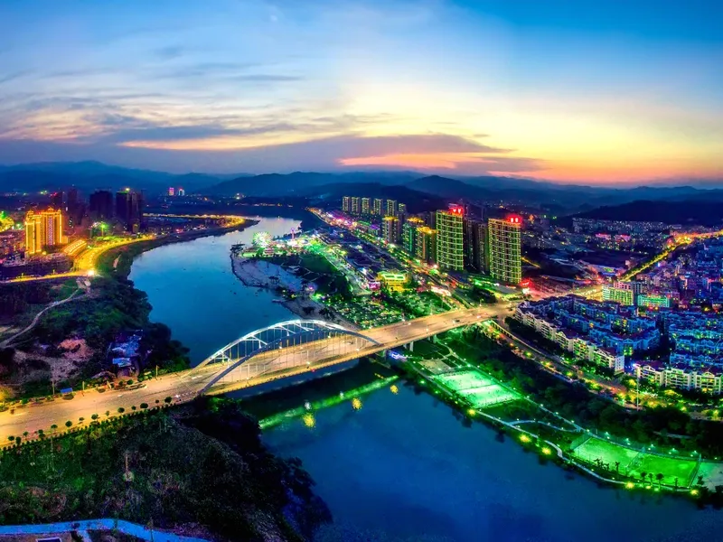 Baise Red Land landscapes with mango plantations and historical memorials commemorating revolutionary heritage