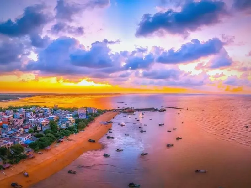 Qinzhou coastal port with mangroves and sandy beaches, showcasing its industrial growth and maritime culture