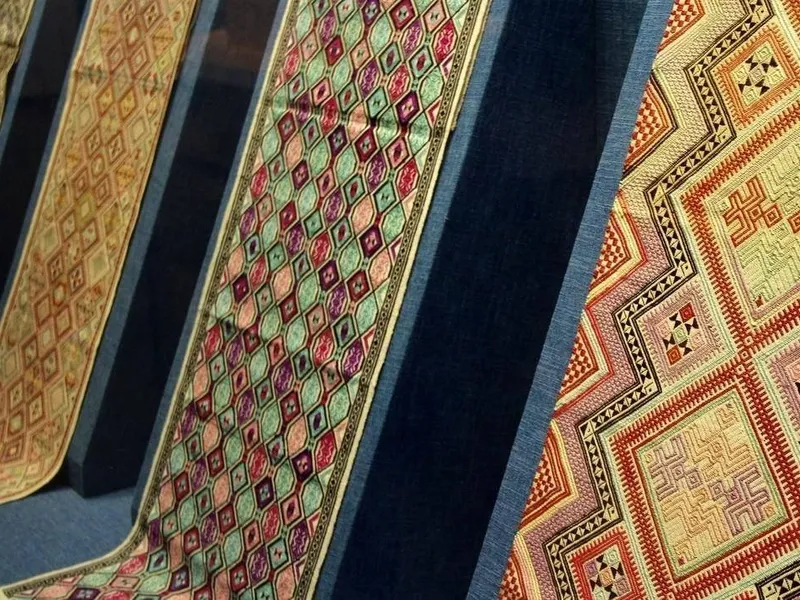 Zhuang brocade fabric displaying vibrant colors and intricate traditional patterns