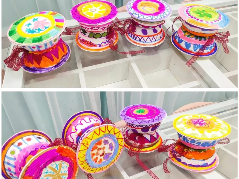 Miniature bronze drums engraved with traditional motifs