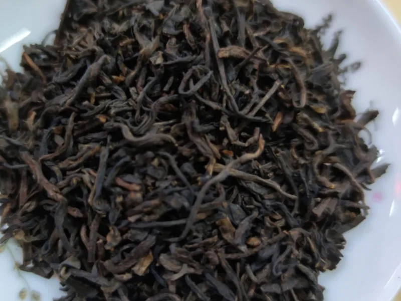 Wuzhou Liubao dark tea leaves in traditional packaging