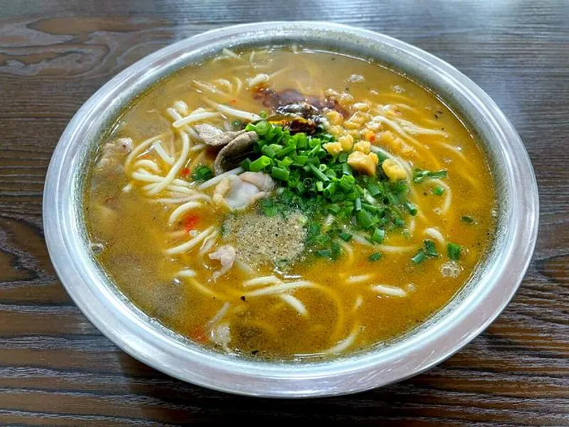 Nanning Old Friend Noodles with sour bamboo shoots and minced pork