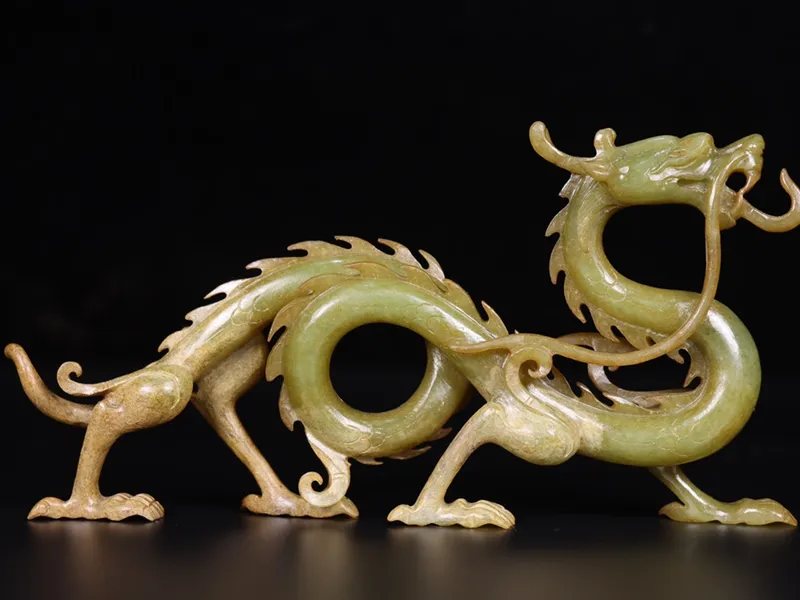 Close-up of a Chinese dragon head with expressive eyes, whiskers, and horns