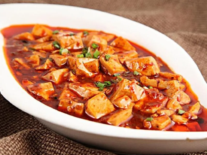 Spicy Sichuan mapo tofu served over steamed rice
