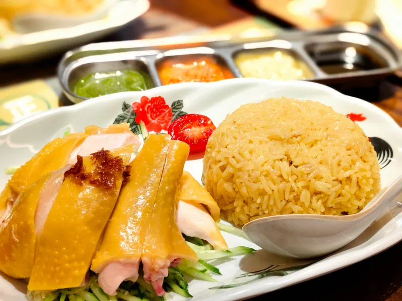 Hainanese chicken rice with boiled chicken and fragrant rice