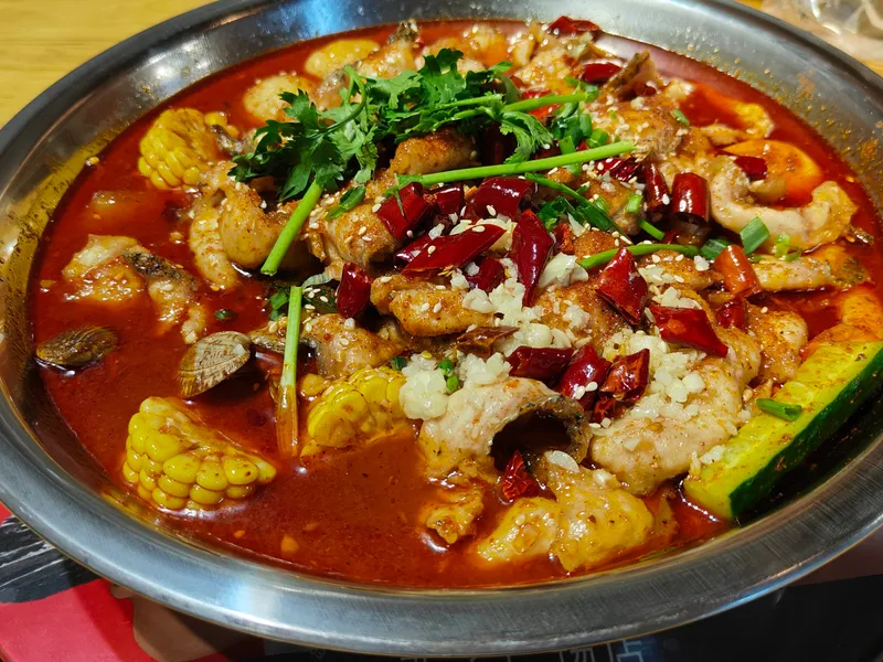 Sichuan spicy fish in red chili oil with aromatic spices