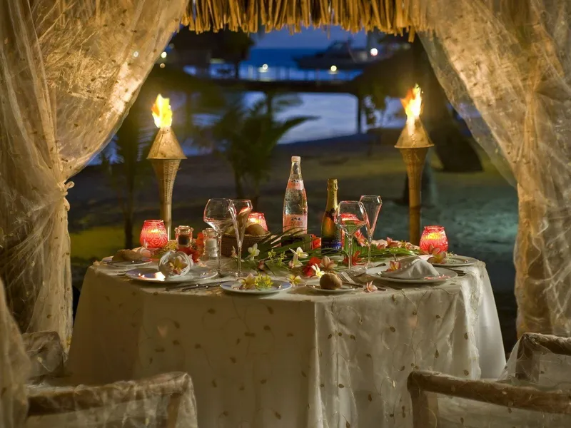 A colorful spread of traditional Chinese dinner dishes, including Peking Duck, Mapo Tofu, Dongpo Pork, hot pot, and stir-fried vegetables, illustrating the diversity, balance, and communal nature of Chinese evening meals.