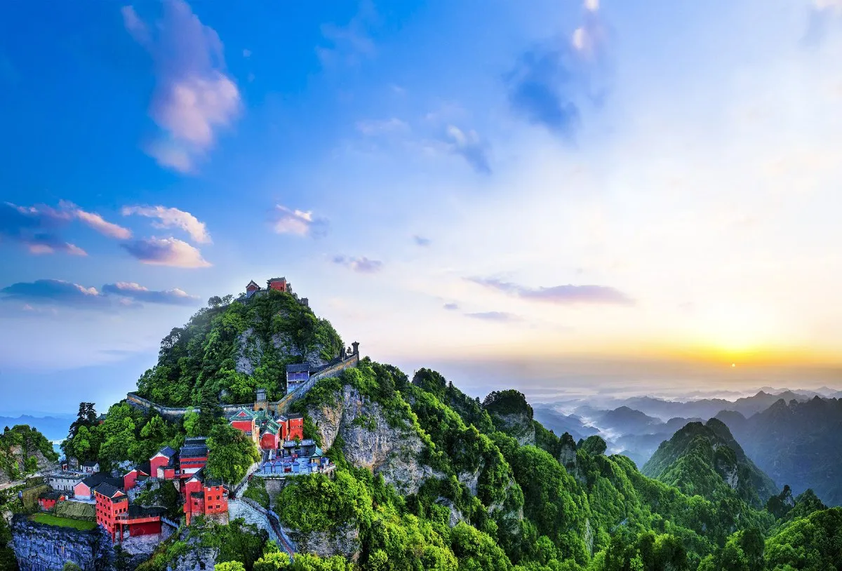 Wudang Mountain in China showing Taoist temples, scenic peaks, and martial arts practice, highlighting spiritual and cultural heritage.