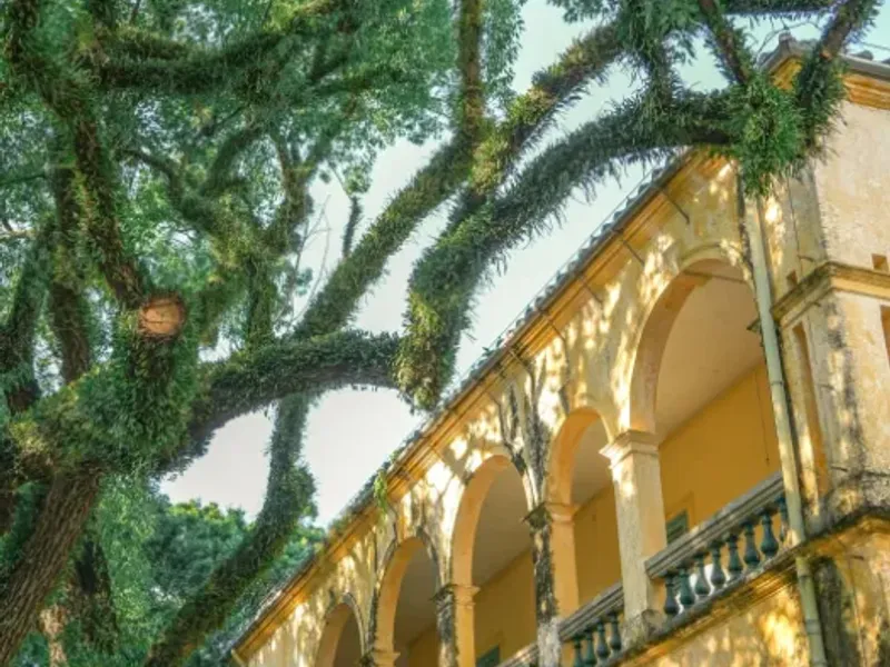 Beihai's Silver Beach with its characteristic fine white sand stretching along the coastline, and volcanic scenery of Weizhou Island in the background.
