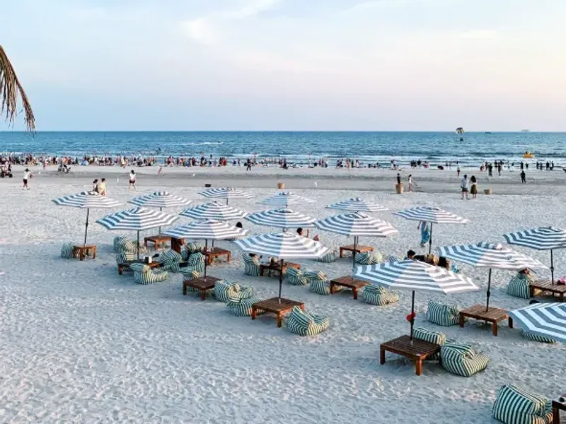 Beihai's traditional fishing culture and coastal lifestyle, showcasing local fishermen at work and traditional boats.