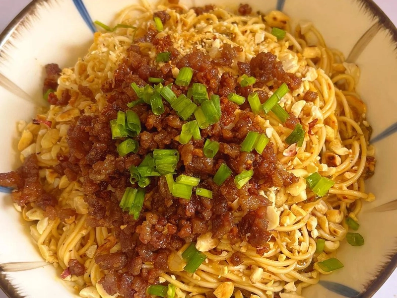 Illustration of the concept of Chinese noodles (面条, miàn tiáo) depicted with steaming bowls of noodles, chopsticks lifting strands, regional ingredients like vegetables and sauces, and iconic noodle-making techniques, representing culinary tradition, cultural heritage, regional diversity, and the artistry of Chinese cuisine.