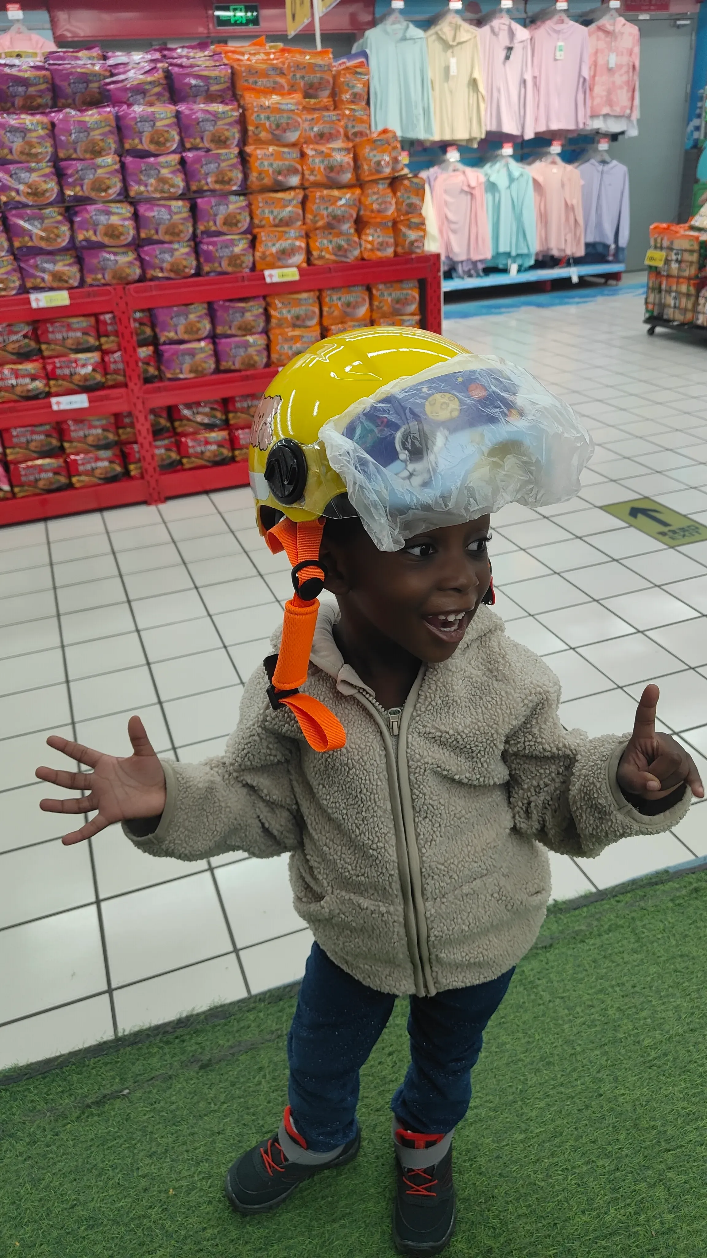 Cute African student child dancing during Chinese language activity at RPL School, China