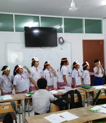 Students learning Chinese in classroom at RPL School Beihai